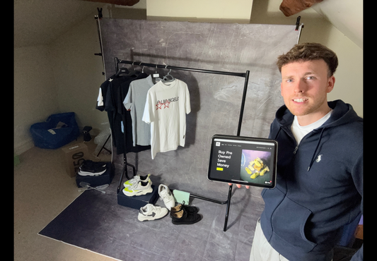 Tom Reader, Owner of ReaderSells next to showcase items.